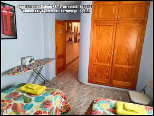 Łóżko lub łóżka w pokoju w obiekcie Apartamento Galeon XXI