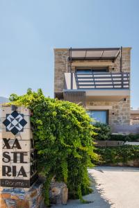 a sign in front of a house at Xasteria in Elafonisi