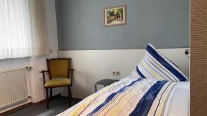 Postel nebo postele na pokoji v ubytování Hotel -Pension-Weller