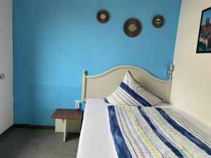 Postel nebo postele na pokoji v ubytování Hotel -Pension-Weller