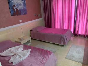 Postel nebo postele na pokoji v ubytování Hotel Tunisie Confort + 16 fotografií