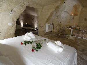 A bed or beds in a room at LA DIMORA DELLE 3 ZIE