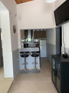 Kuchyňa alebo kuchynka v ubytovaní Ferienhaus "Arizones", Nea Kallikratia, Chalkidiki + 21 fotografií