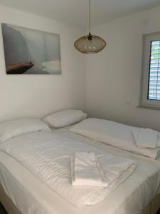 Ein Bett oder Betten in einem Zimmer der Unterkunft Haus Kleinbichler