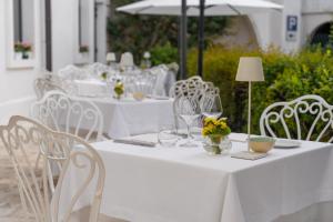 Restoran või mõni muu söögikoht majutusasutuses OSTUNI PALACE - Hotel Bistrot & SPA