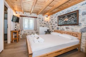 Postel nebo postele na pokoji v ubytování Fairytale Elafonisi