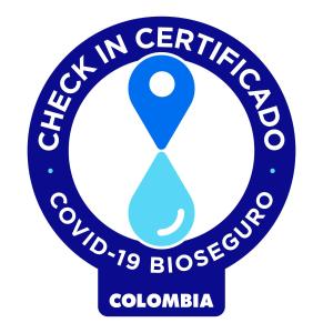 a label for the colombian centre of colombia with a blue pin at Hotel Parque Del Sol in Montería