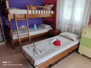 Posteľ alebo postele v izbe v ubytovaní Villa Polina