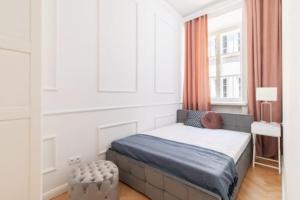 Кровать или кровати в номере Apartamenty-MI Old Town Residence