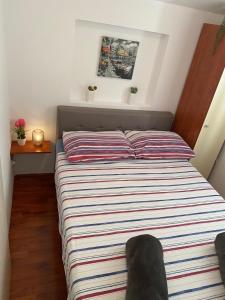 Postel nebo postele na pokoji v ubytování Apartman Beus