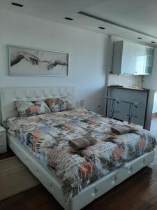 Katil atau katil-katil dalam bilik di Jacuzzi Lux Apartman