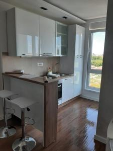 Dapur atau dapur kecil di Jacuzzi Lux Apartman