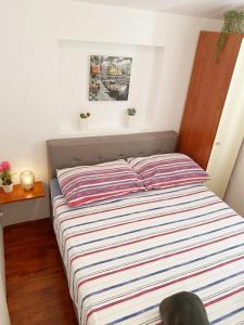 Postel nebo postele na pokoji v ubytování Apartman Beus