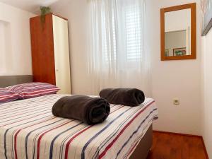 Postel nebo postele na pokoji v ubytování Apartman Beus