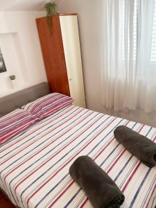 Postel nebo postele na pokoji v ubytování Apartman Beus