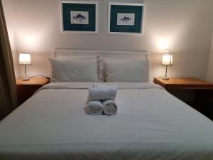 Łóżko lub łóżka w pokoju w obiekcie Keurbooms River Apartment