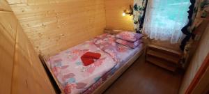 Postel nebo postele na pokoji v ubytování Järve Cottages