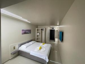 Voodi või voodid majutusasutuse Jxn Rooms toas