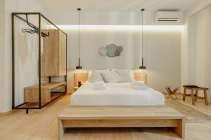 Krevet ili kreveti u jedinici u okviru objekta Casa Costa Suites Plus