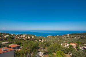 a view of the ocean from a house at Elena Studios in Athani