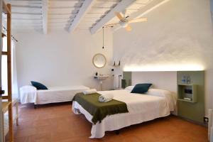 Postel nebo postele na pokoji v ubytování Hostal l'Estrella