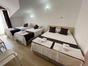 Postel nebo postele na pokoji v ubytování Nefis Hotel Ölüdeniz