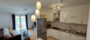 Kuhinja oz. manjša kuhinja v nastanitvi Apartments Marijana