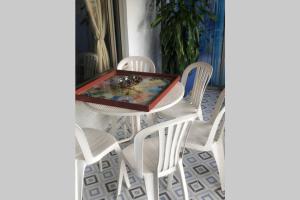 Fotografija u galeriji objekta CHALET SANTORINI u gradu Calima