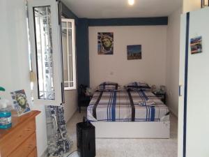 Posteľ alebo postele v izbe v ubytovaní Apollon Apartments H-2