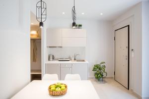 Kuchyň nebo kuchyňský kout v ubytování Calmare suites