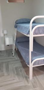 Krevet ili kreveti na sprat u jedinici u okviru objekta I TRAMONTI D'ASPRA