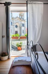 A bed or beds in a room at La casetta sulle Stelle