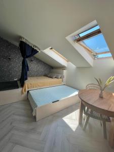 Tempat tidur dalam kamar di Boho Studio Nida
