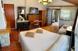 Postel nebo postele na pokoji v ubytování Studio Villa Mattossi