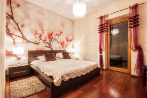 Posteľ alebo postele v izbe v ubytovaní ApartSerwis Gorące Źródła - Apartament Kozi Wierch