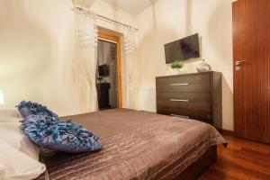 Posteľ alebo postele v izbe v ubytovaní ApartSerwis Gorące Źródła - Apartament Kozi Wierch