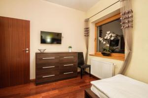 Posteľ alebo postele v izbe v ubytovaní ApartSerwis Gorące Źródła - Apartament Kozi Wierch