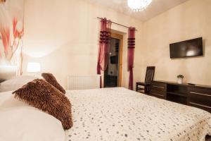Posteľ alebo postele v izbe v ubytovaní ApartSerwis Gorące Źródła - Apartament Kozi Wierch