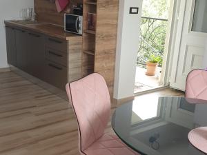Kuchyň nebo kuchyňský kout v ubytování Apartment Mia 2