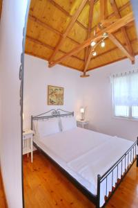 A bed or beds in a room at Katerina