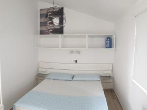 Postel nebo postele na pokoji v ubytování Apartment Mia 2
