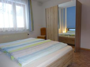Postel nebo postele na pokoji v ubytování Gästehaus Sonneck + 32 fotografií