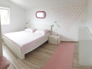 Postel nebo postele na pokoji v ubytování Apartment Mia 2
