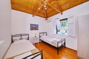 A bed or beds in a room at Katerina