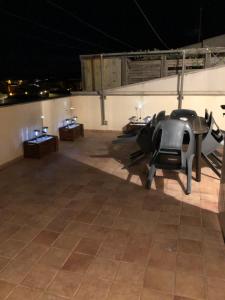 a helicopter parked on top of a building at night at Apartamentos En Deltebre in Deltebre