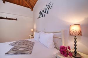 A bed or beds in a room at Katerina