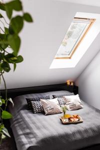 Posteľ alebo postele v izbe v ubytovaní Apartament w centrum 3