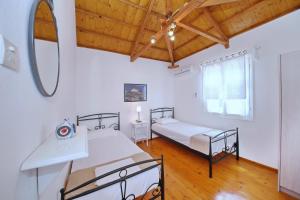A bed or beds in a room at Katerina