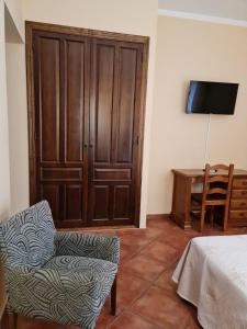 TV a/nebo společenská místnost v ubytování Hotel Plateros
