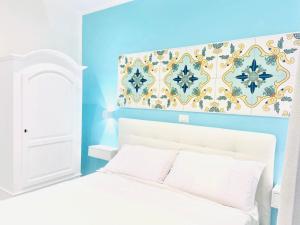 Postel nebo postele na pokoji v ubytování Cilento Experience rooms